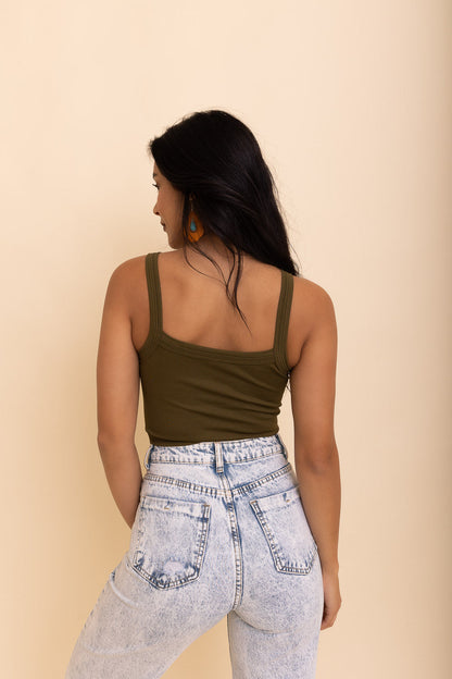Seamless brami top from Periwinkle Aether in moss green, featuring a sleek, fitted design perfect for layering or everyday wear.
