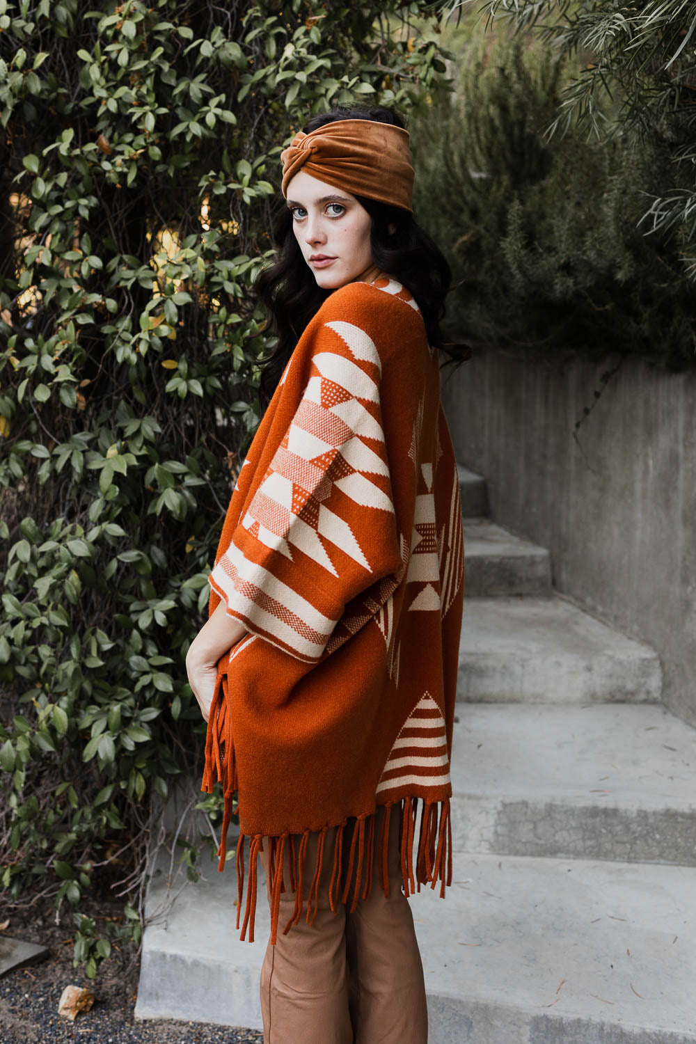 Periwinkle Aether Aztec Luxe fringed ruana in warm bronzer tones, lightweight accessories for stylish layering.