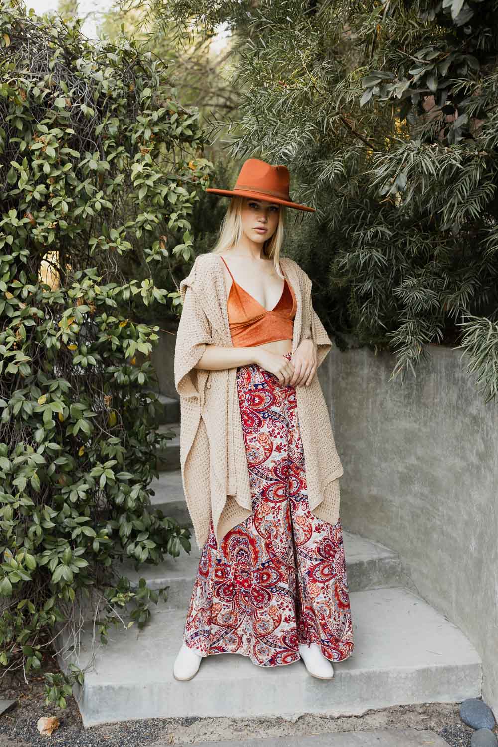 Beige cozy soft waffle hooded ruana by Periwinkle Aether, featuring a relaxed, warm design perfect for layered accessories.