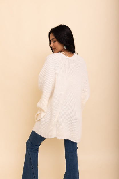 Ivory boucle cardigan from Periwinkle Aether&