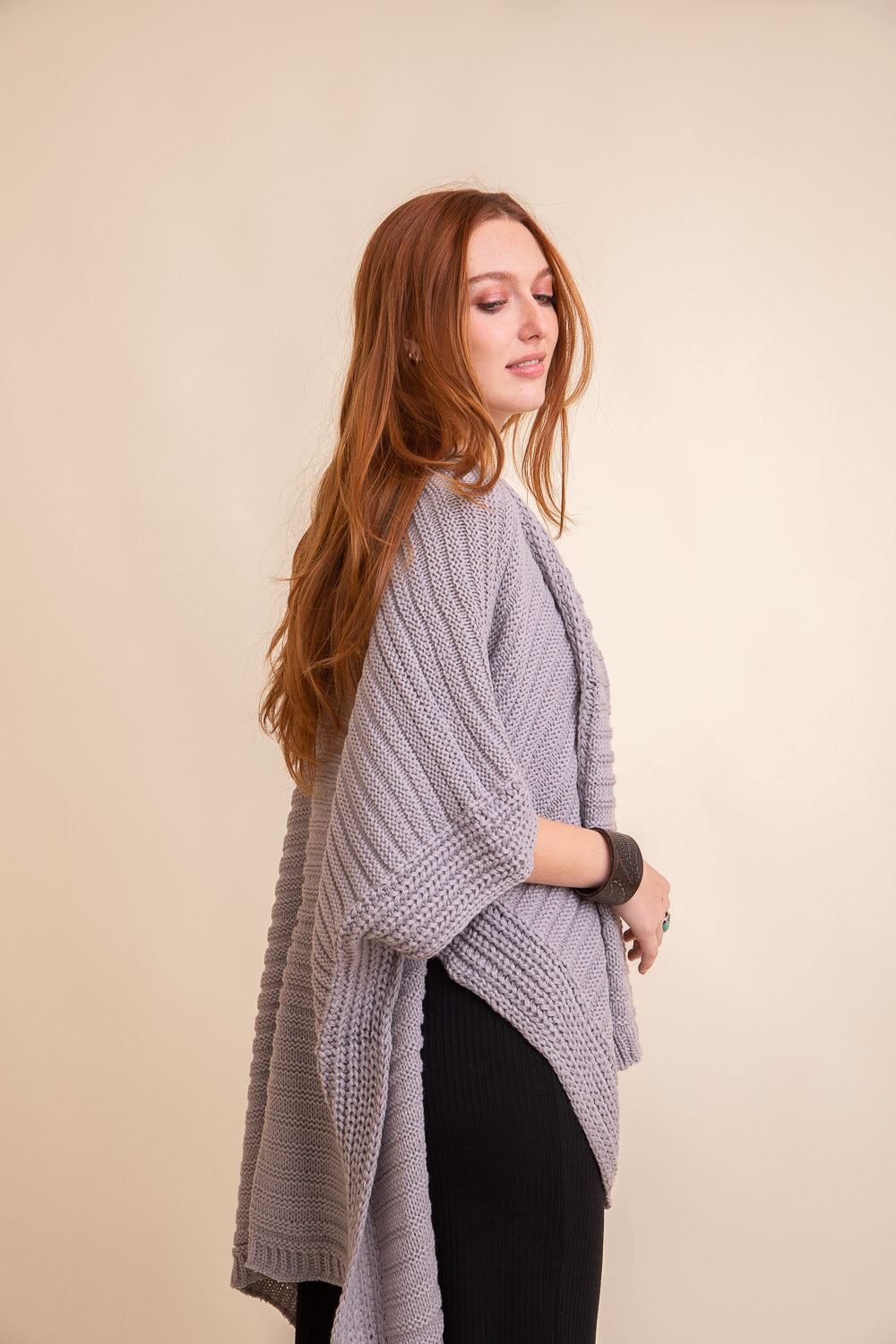 Gray ridged rib knit ruana by Periwinkle Aether, stylish layering wrap with textured rib design, perfect for cozy accessories.