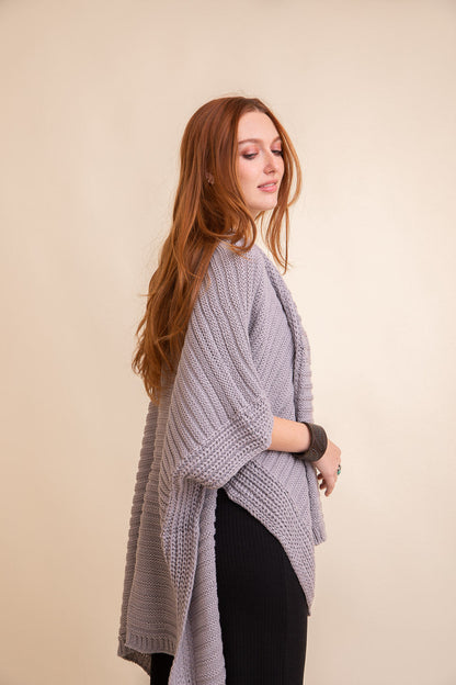 Gray ridged rib knit ruana by Periwinkle Aether, stylish layering wrap with textured rib design, perfect for cozy accessories.