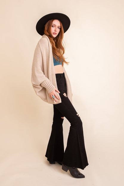 Start2Finish beige gear with multiple straps and buckles, casual style, shown on a model.