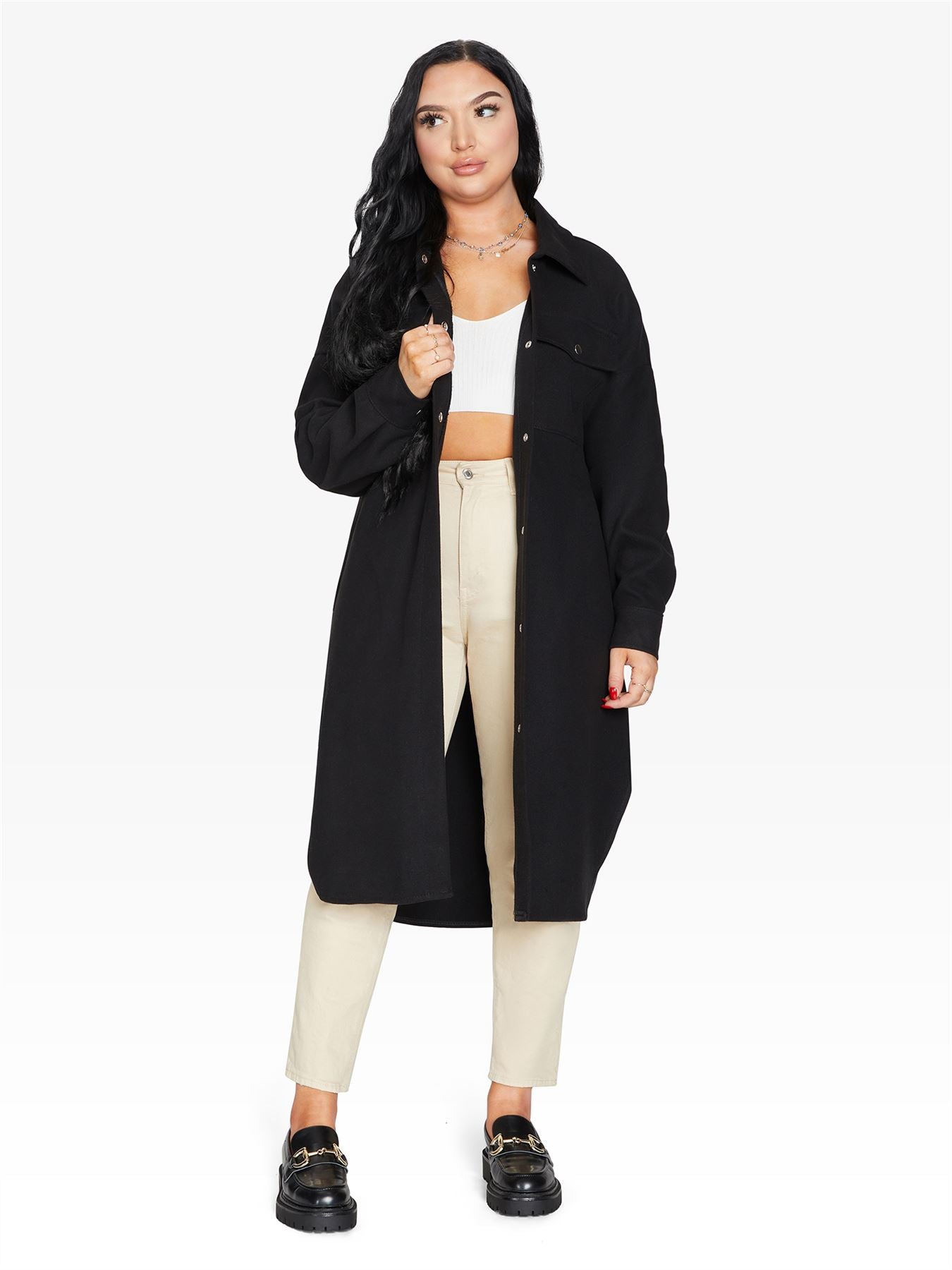Rose Eleusis oversized longline shacket in beige, featuring a relaxed fit and button front, perfect for layering in cooler weather.