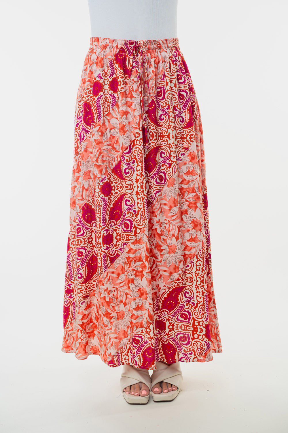White Birch floral woven skirt by Jade Icarus, high-waisted full size with intricate floral pattern and woven fabric texture.