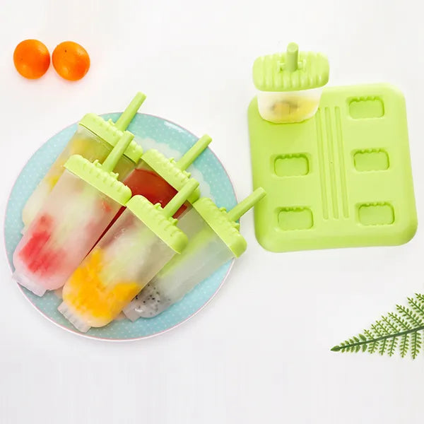 Six reusable Pear Daisy popsicle molds with colorful ice pop sticks on a white background for homemade frozen treats.