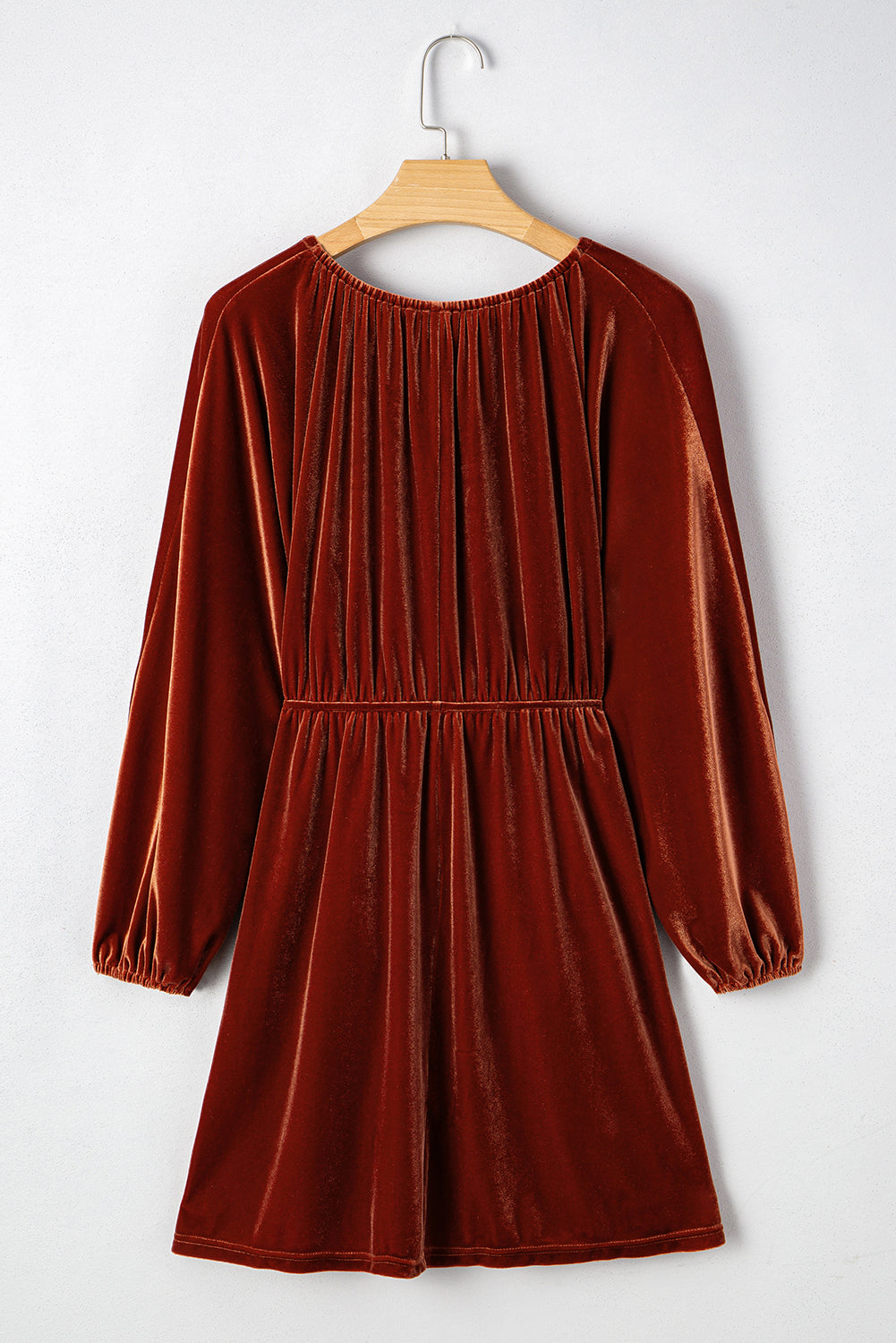 Velvet elastic V-neck puff sleeve mini dress by Byzantium Bay, featuring a fitted silhouette and stylish puff sleeves.
