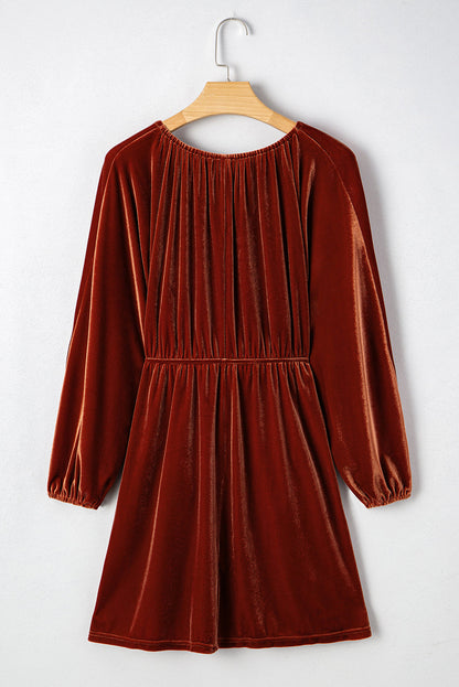 Velvet elastic V-neck puff sleeve mini dress by Byzantium Bay, featuring a fitted silhouette and stylish puff sleeves.