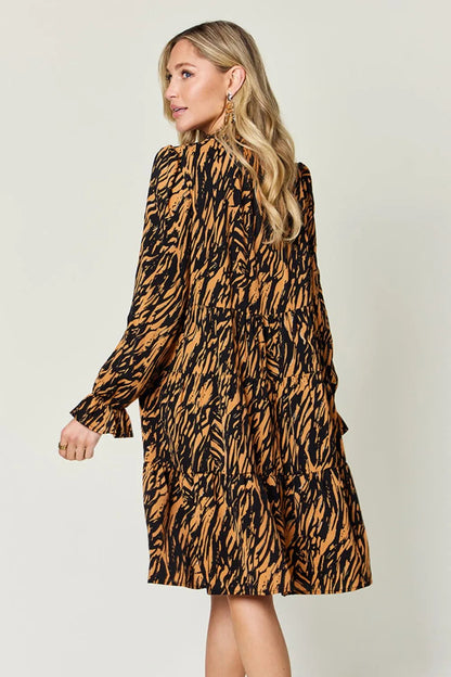 Pear Daisy Double Take printed ruffle hem long sleeve dress, featuring a full size design with vibrant floral patterns