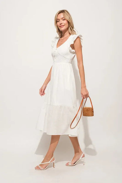 Pear Daisy ruffle sleeve front smocked tiered midi dress with floral pattern, perfect for home and garden casual wear.