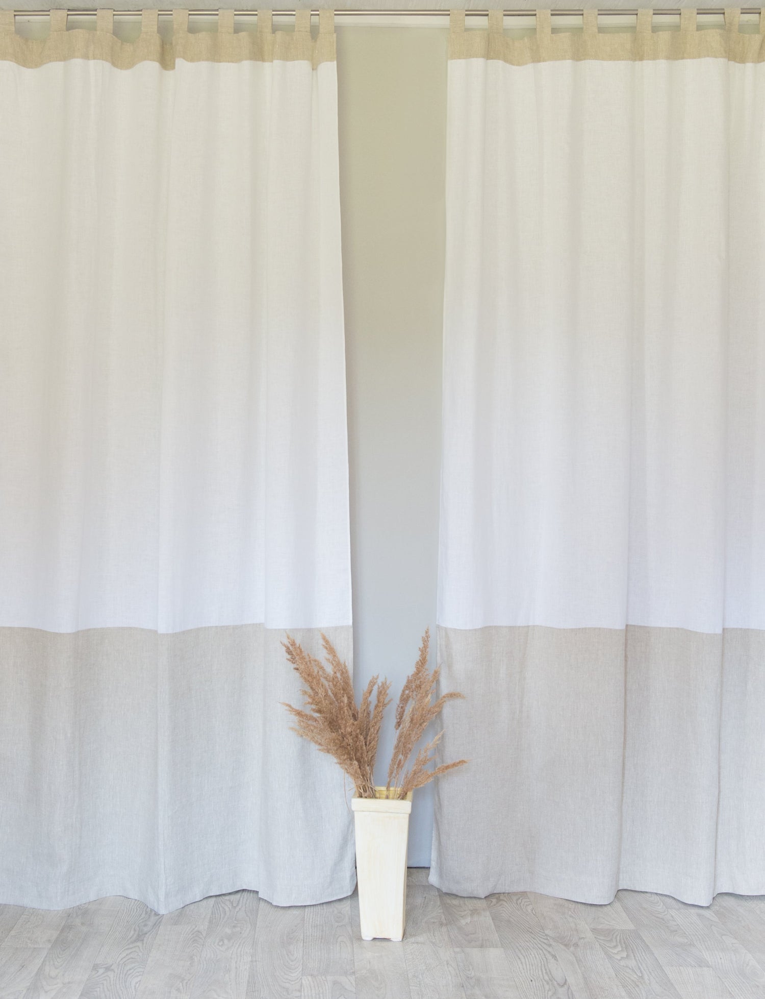 White and natural light linen curtains with tab tops in two tones, stylish home decor by Magenta Sugarplum.