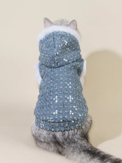 Sequin pet coat with fur trim from Pear Daisy, designed for pets, featuring shiny sequins and cozy fur accents.