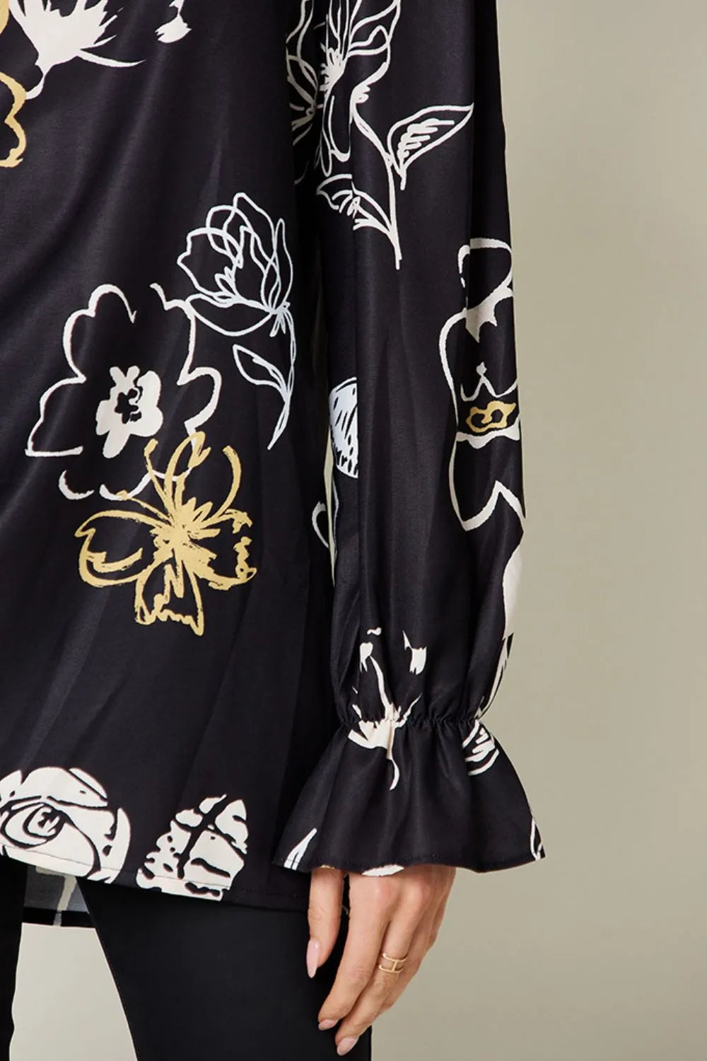 Pear Daisy Double Take printed flounce sleeve blouse, full size, showcasing vibrant floral design and stylish fashion details.