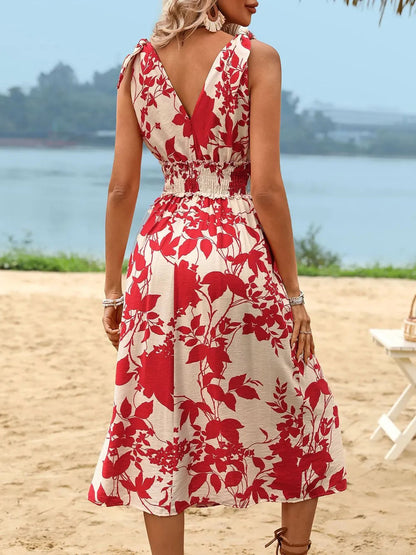 Ruby Styx Perfee smocked printed surplice midi dress for women, featuring a flowy silhouette and vibrant floral pattern.
