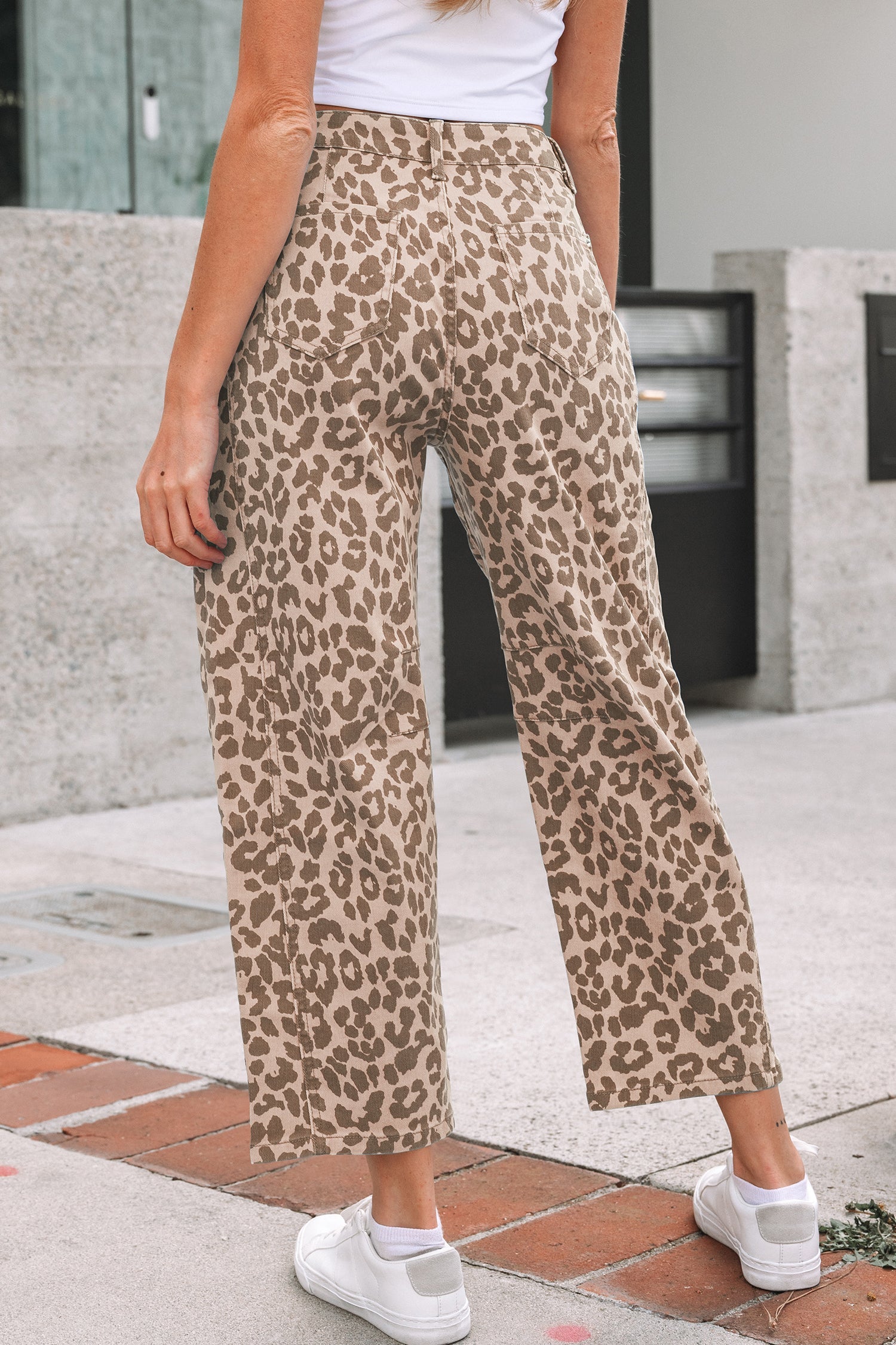 Leopard print high waist straight jeans for women by Byzantium Bay, showcasing fitted waistband and straight leg design.