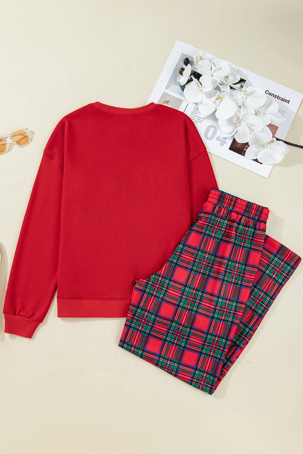 Byzantium Bay Christmas plaid mama pullover and matching pants set displayed on a model with festive holiday style.
