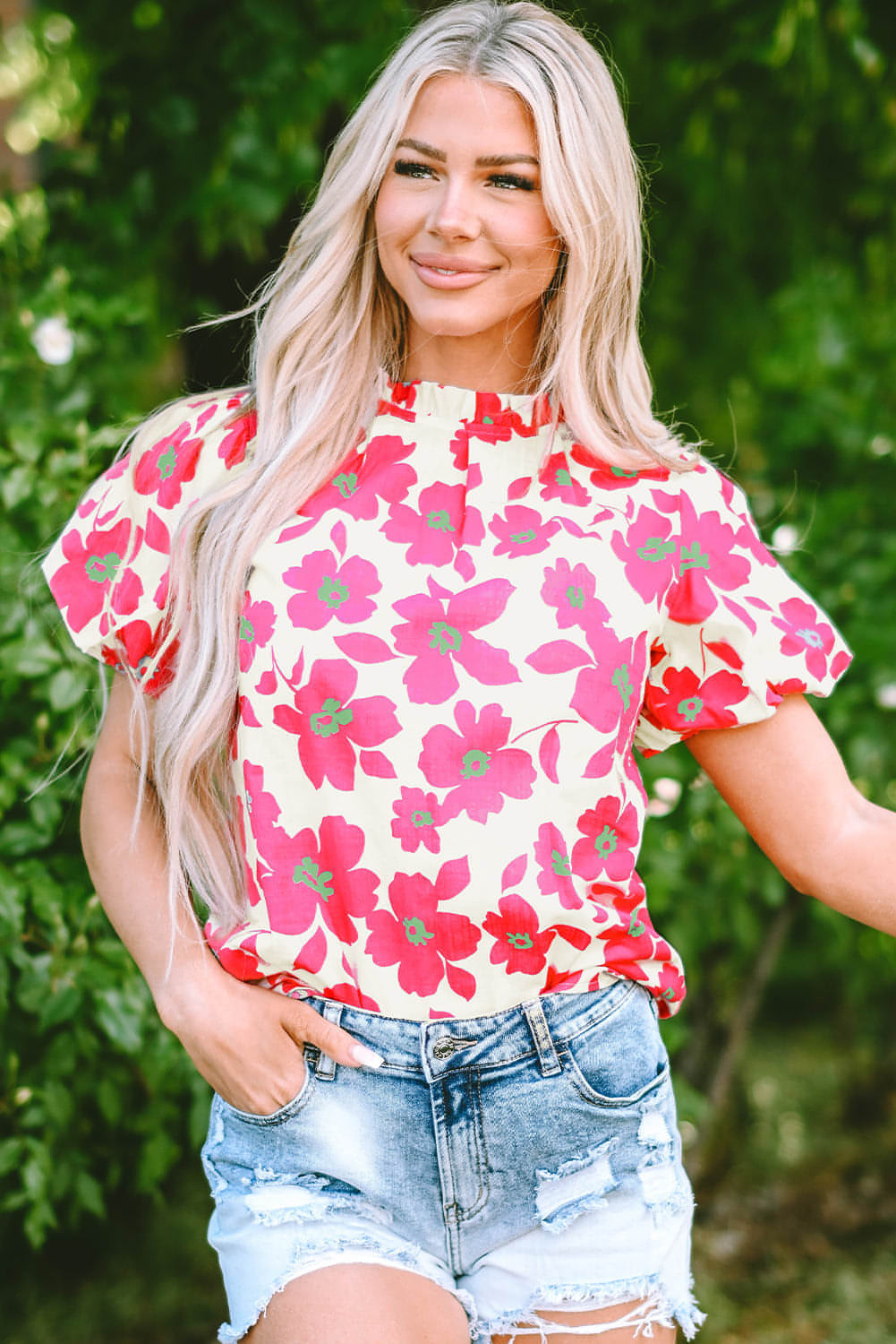 Beige floral puff sleeve blouse with frilled neckline by Carmine Juneberry, showing detailed fabric and stylish design.