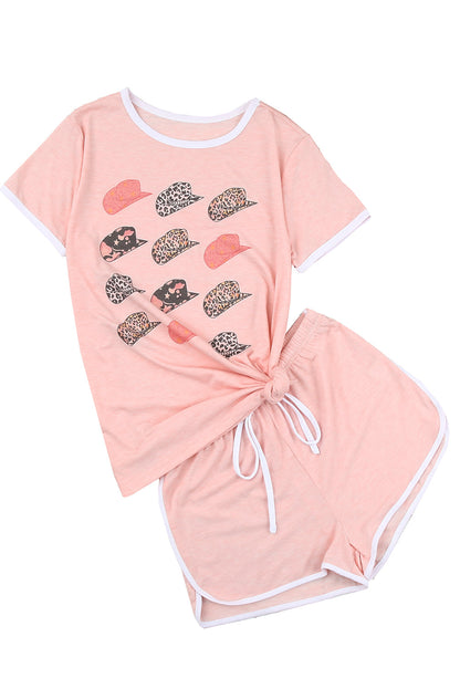 Pink leopard print short sleeve T-shirt and drawstring shorts set by Harlequin Daisy, perfect for bath and beauty leisure wear.