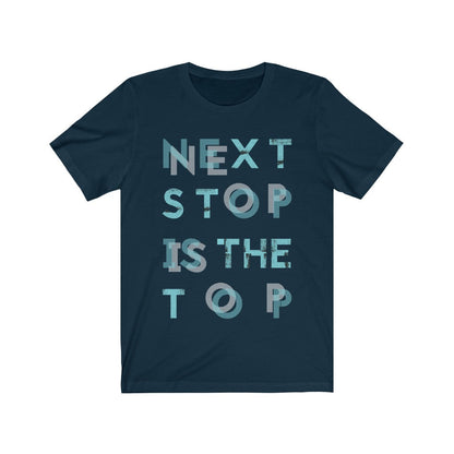 Plum Charlie Next Stop is The Top T-shirt featuring bold printed text on a casual crew neck shirt.