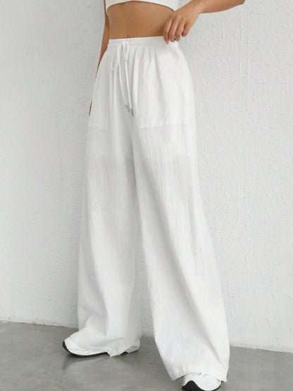 Carmine Juneberry drawstring wide-leg pants in lightweight fabric, featuring a relaxed fit and casual style.