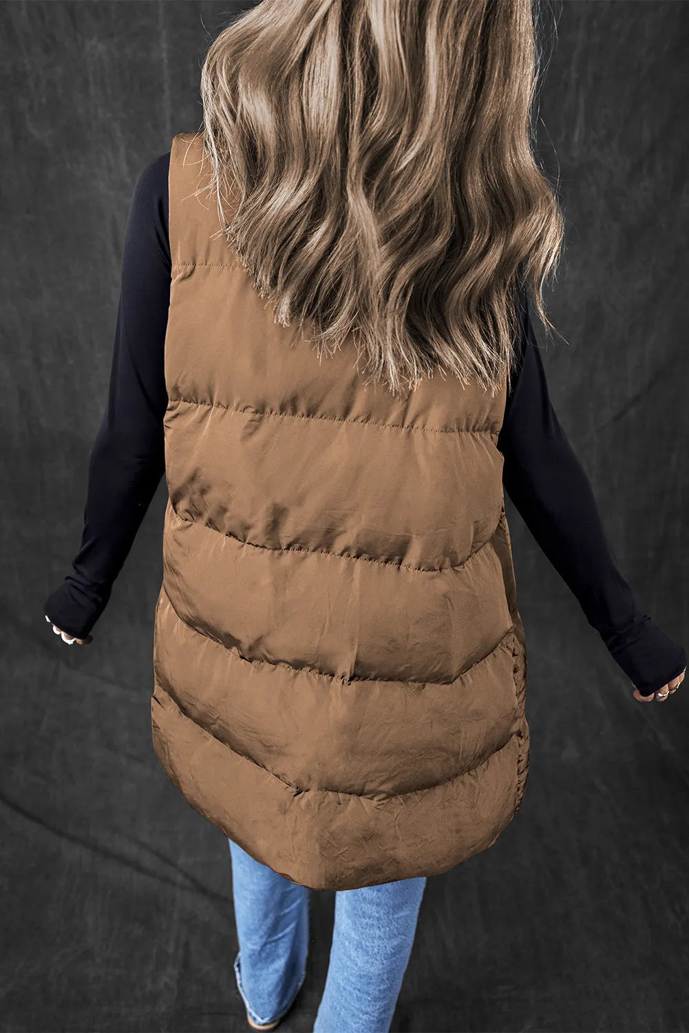 Pear Daisy pocketed zip-up vest coat for home and garden, shown in a natural outdoor setting with pockets and full zip closure.