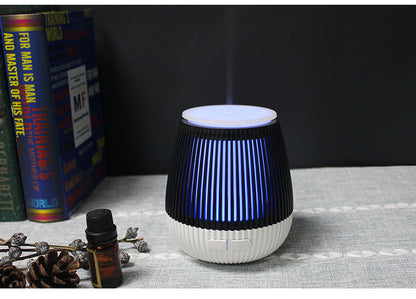 Colorful USB aromatherapy humidifier fragrance lamp by Pink Lucky with a sleek design, emitting soft light and mist.