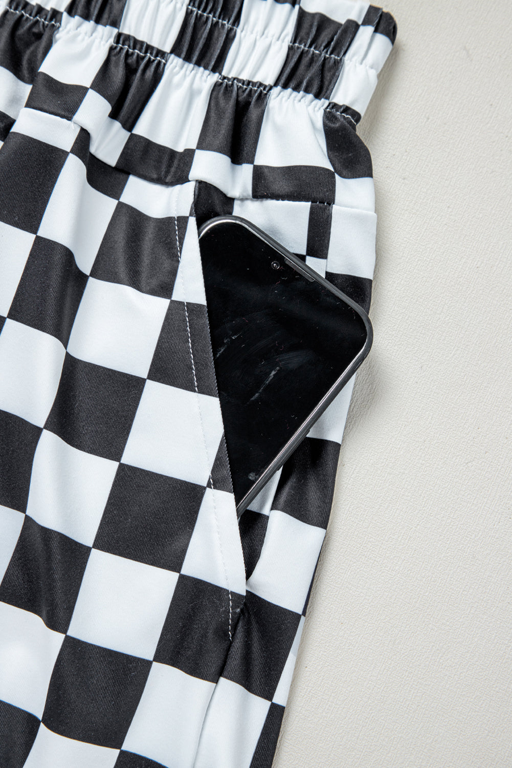 Black checkered print high waist casual shorts for women by Ruby Styx, featuring a stylish relaxed fit and comfortable design.