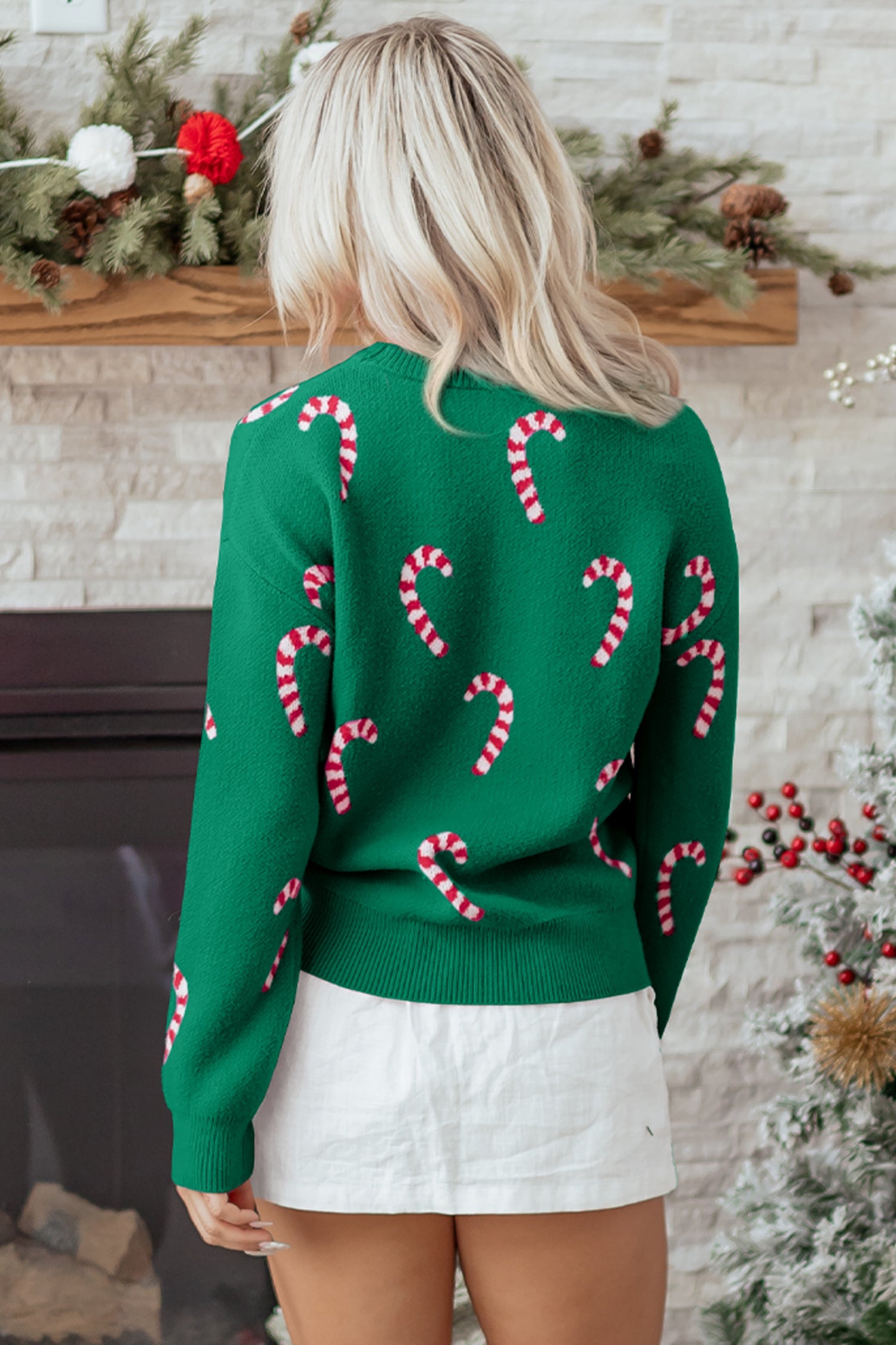 Byzantium Bay Christmas Candy Cane Drop Shoulder Sweater featuring red and white candy cane pattern and cozy knit design.