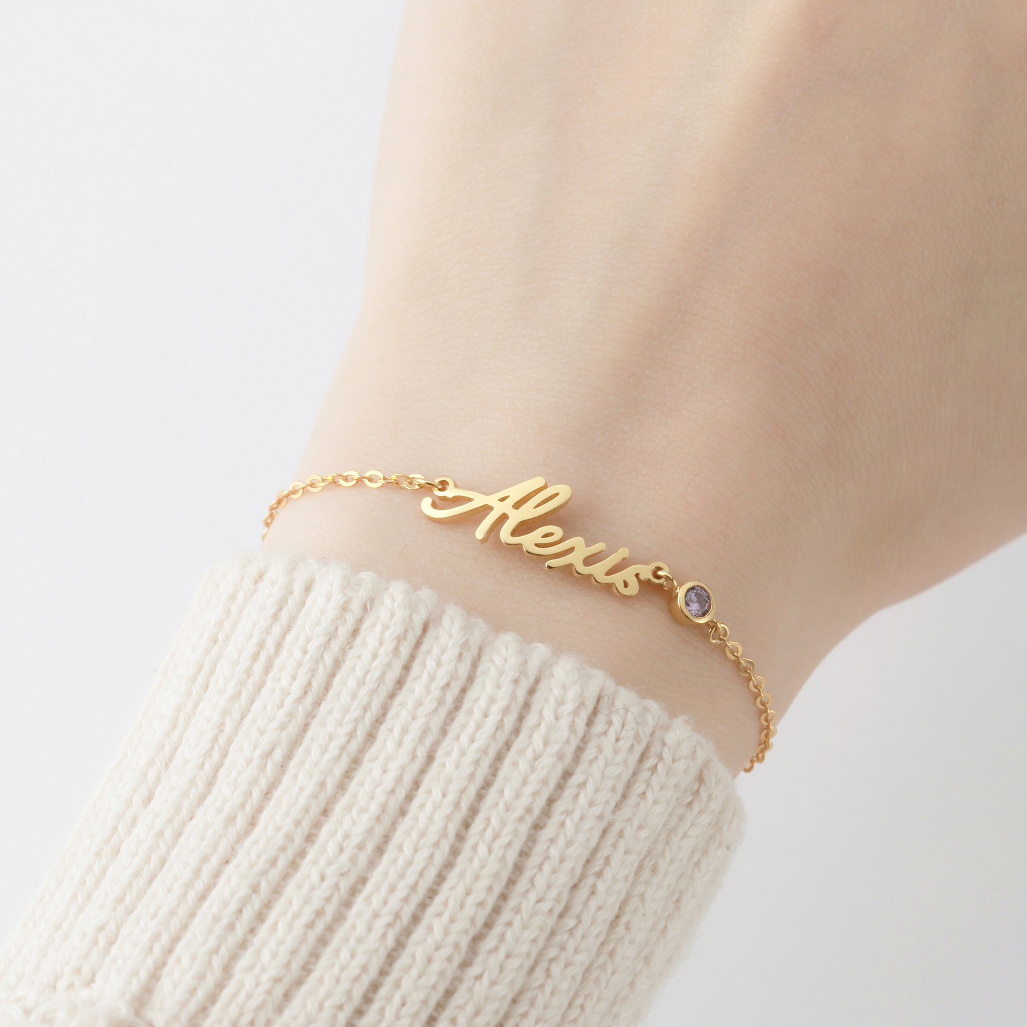 Personalized green Millie cursive name bracelet for tween girls, featuring a stylish bracelet with custom name engraving.