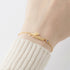 Personalized green Millie cursive name bracelet for tween girls, featuring a stylish bracelet with custom name engraving.