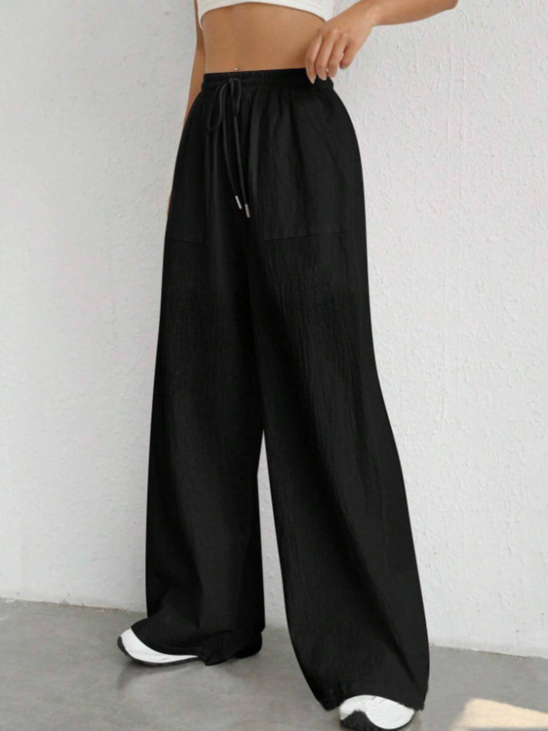 Carmine Juneberry drawstring wide-leg pants in lightweight fabric, featuring a relaxed fit and casual style.