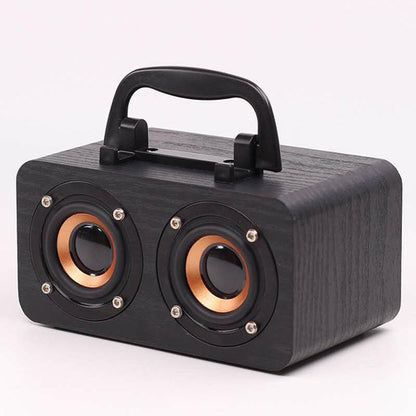 Maroon Asteria wooden portable wireless Bluetooth speaker for outdoor use, showing its compact design and rustic wooden finish.