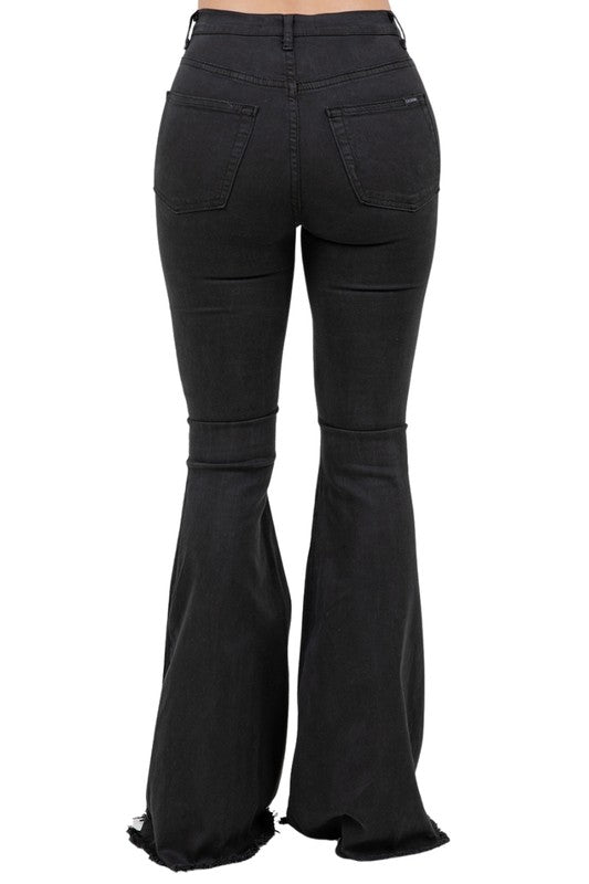 Jade Icarus Rodeo Jean Blk/Brwn automotive seat cover with 30-inch inseam, featuring black and brown fabric and detailed stitching.