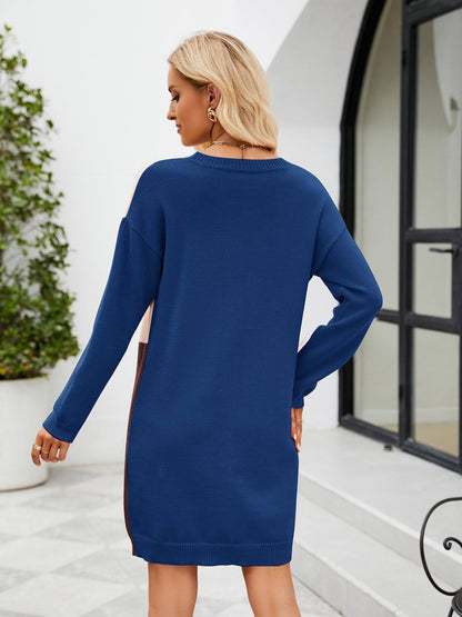 Color block dropped shoulder sweater dress by Carmine Juneberry, featuring a cozy knit fabric with bold color blocking design.