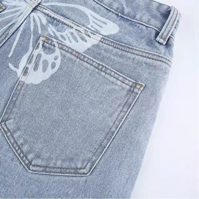 Carmine Juneberry Street Print Denim jeans from Haute Edition 25 featuring bold street art print and classic denim style.