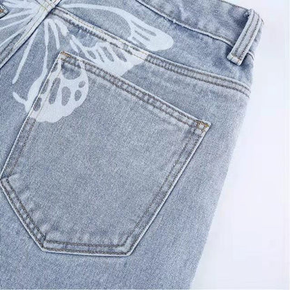Carmine Juneberry Street Print Denim jeans from Haute Edition 25 featuring bold street art print and classic denim style.