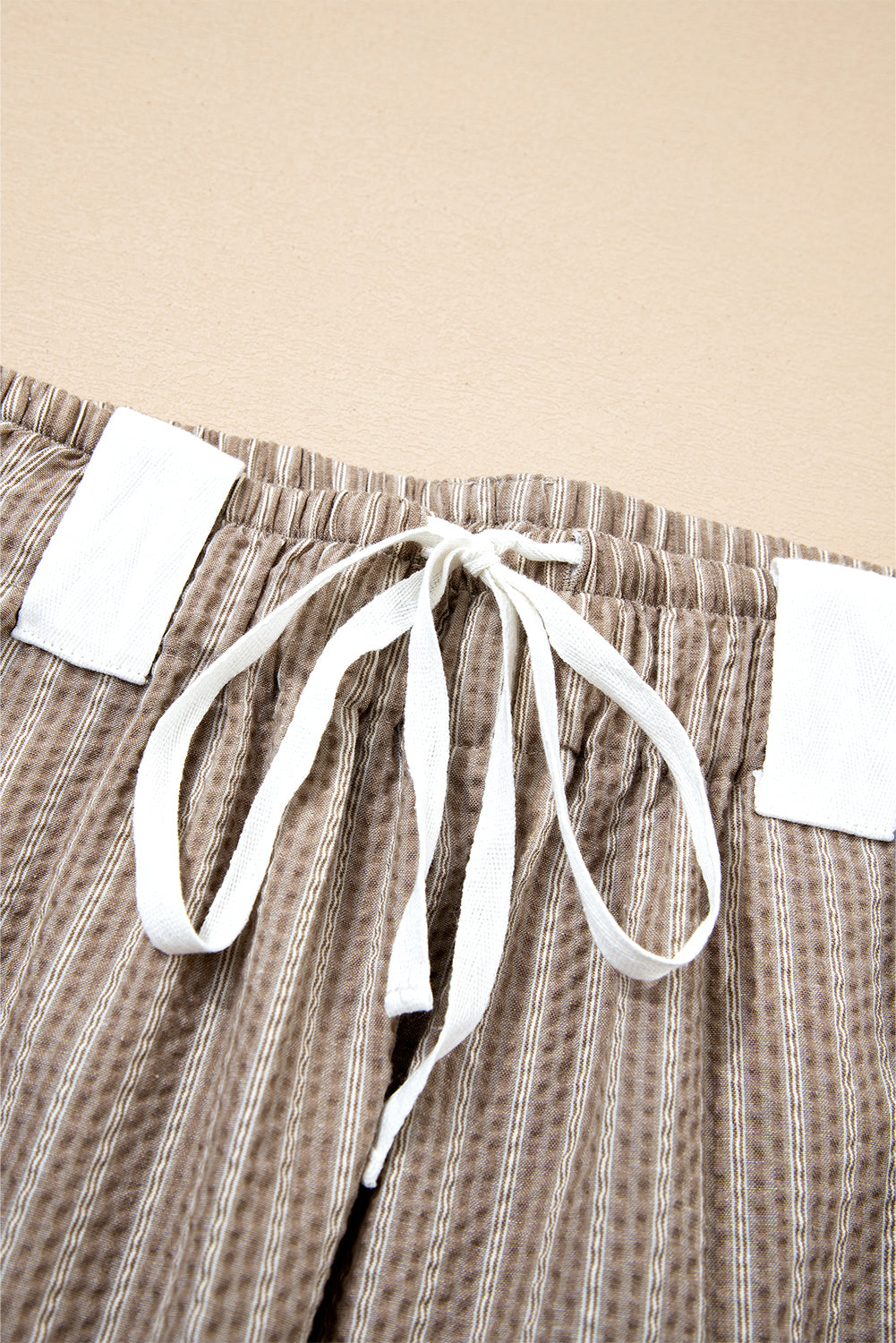 Byzantium Bay Stripe drawstring cargo jogger pants with multiple pockets and relaxed fit, suitable for casual wear.