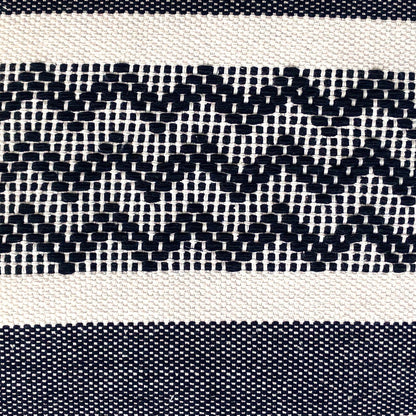 Close-up of Violet Athena zig zag accent cotton pillow cover with a geometric pattern and soft fabric texture.