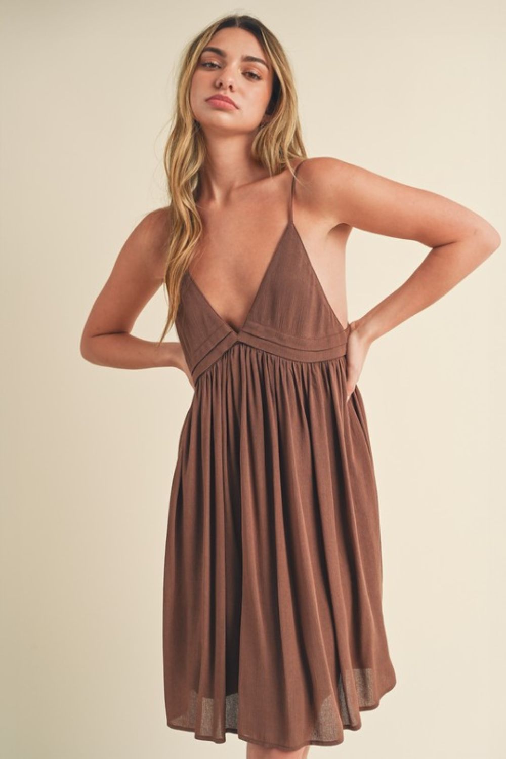 Jade Icarus Aemi + Co Ruched Plunge Mini Cami Dress for women, featuring a fitted ruched design and plunging neckline.