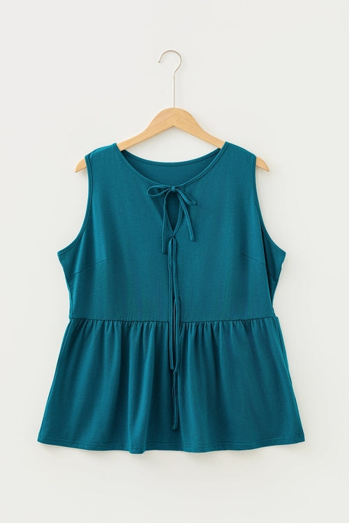 Plus size solid bow-tie peplum tank top for women by Byzantium Bay, featuring a stylish bow detail and flattering peplum fit.
