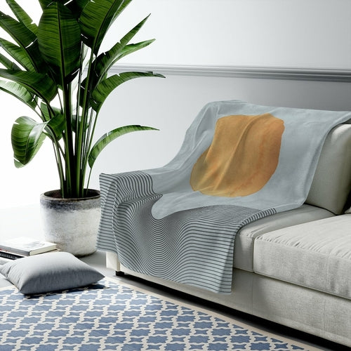 Blue plush throw featuring abstract sun art design, available in three sizes, by Yellow Pandora home decor brand.