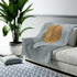 Blue plush throw featuring abstract sun art design, available in three sizes, by Yellow Pandora home decor brand.