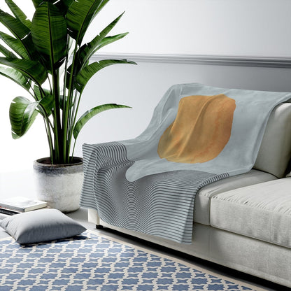 Blue plush throw blanket with abstract sun art design from Yellow Pandora, available in three sizes for home decor.