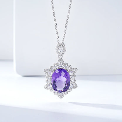 Carmine Juneberry LuxeJewels Amélys Clarity Pendant necklace with sparkling gemstone on a delicate chain.