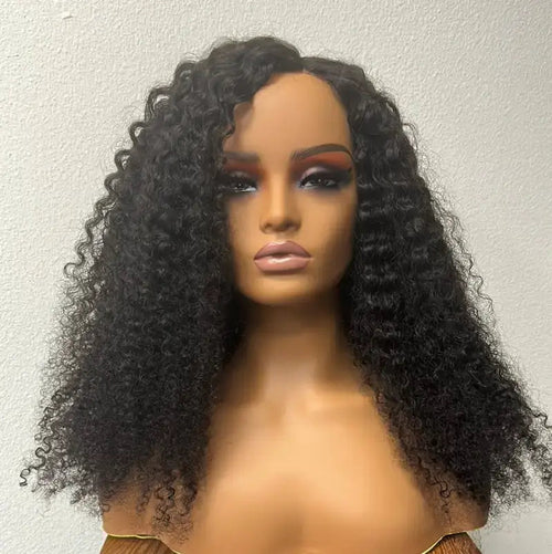 Voluminous Afro Curly Wig by Peach Clymene with bold, bouncy curls made from premium human hair for a striking look