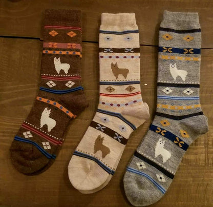 Brown Alpaca Watching Socks by Milky Way featuring a cozy design with alpaca illustrations, suitable for children.