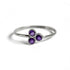 Sterling silver ring featuring a large purple amethyst cluster, crafted by Grey Clymene, showcasing elegant jewelry design.