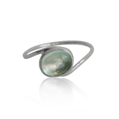Sterling silver Aquamarine Oval Twist Ring with a polished gemstone, featuring a unique twisted band design by Grey Clymene.