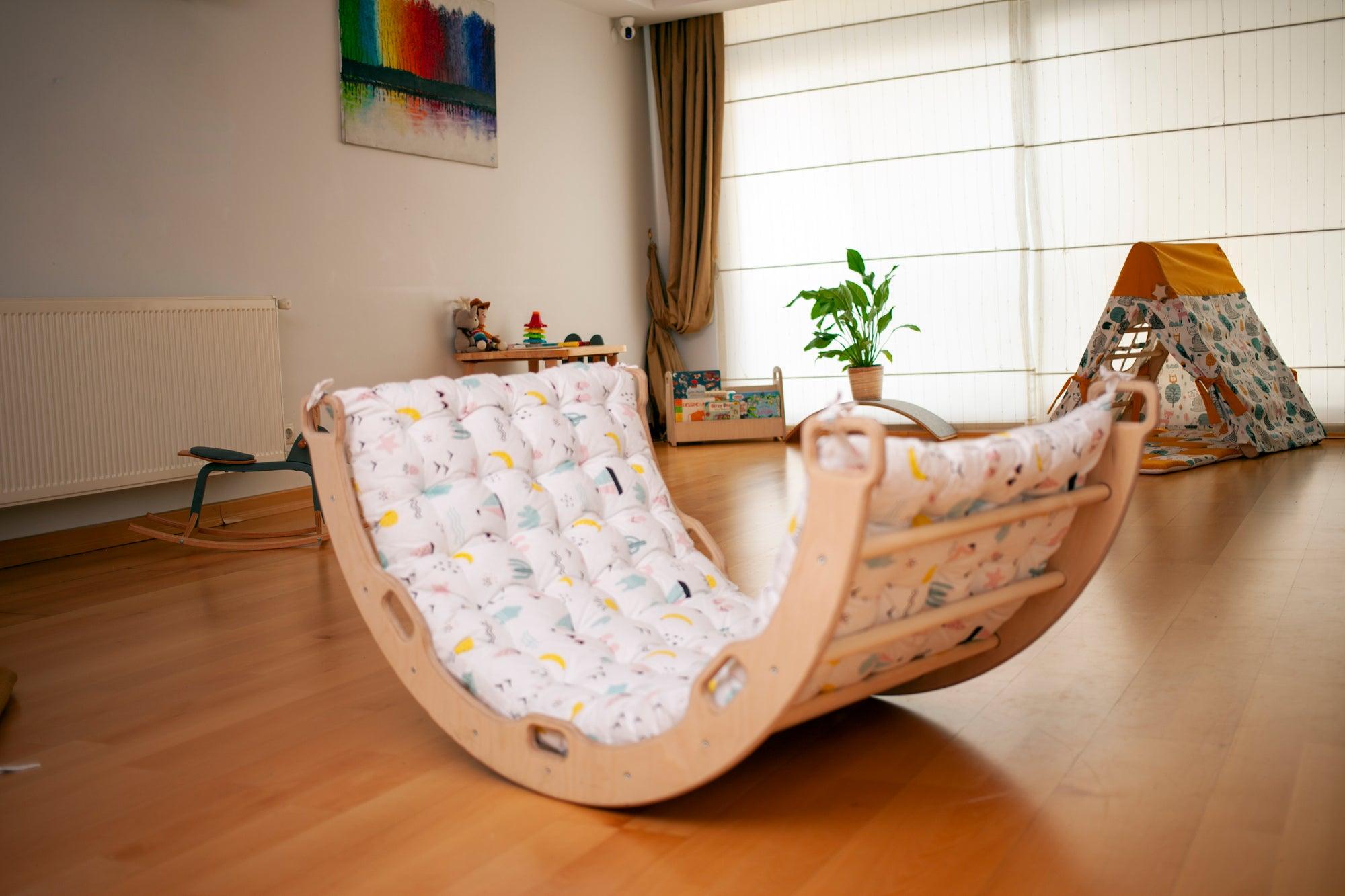 Red Oceanus climbing arch with flamingo pattern pillow, a colorful furniture piece featuring a playful flamingo design.