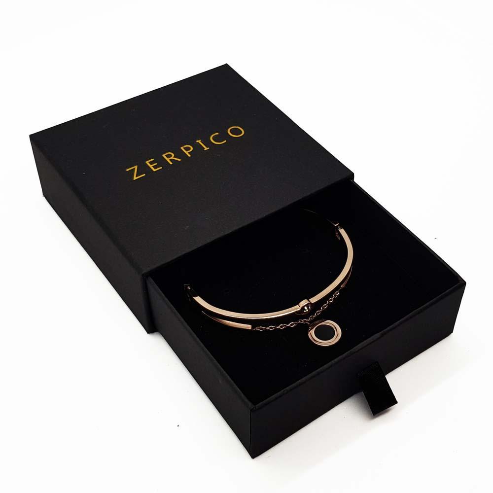 White Poppy Jericho Rosé Gold Bracelet, elegant jewelry bracelet with a sleek rose gold finish, displayed on a neutral background.